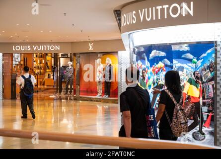 Shoppers walk past the French multinational Chanel clothing and beauty  products brand store in Hong Kong. (Photo by Budrul Chukrut / SOPA Images/Sipa  USA Stock Photo - Alamy