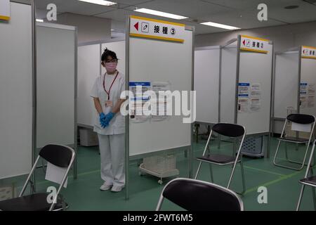 Tokyo, Japan. 24th May, 2021. A nurse waits to inoculate people with the Moderna coronavirus vaccine at the newly-opened mass vaccination centre. With one of the lowest Covid-19 vaccination rates in the developed world and with the Tokyo Olympic Games little over two months away, Japanese authorities have opened mass vaccination sites in Tokyo and Osaka in an effort to boost their coronavirus inoculation campaign. Credit: Carl Court-POOL/ZUMA Wire/Alamy Live News Stock Photo