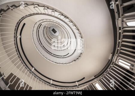 Architectural abstract, upside view of a spiral staircase in the Premier Inn London Blackfriars Stock Photo