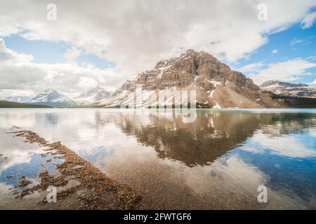 Crowfoot Mountain Reflected in Bow Lake, Banff National Park, Alberta, Canada Stock Photo