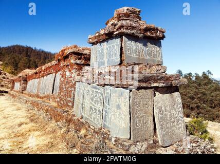 Buddhist prayer mani wall, buddhism in Nepal himalayas Stock Photo
