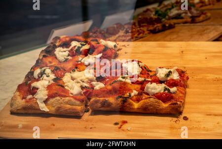 New York, USA. 22nd May, 2021. Pizza displayed a pizzeria in Union Square in New York on Saturday, May 22, 2021. (Photo by Richard B. Levine) Credit: Sipa USA/Alamy Live News Stock Photo