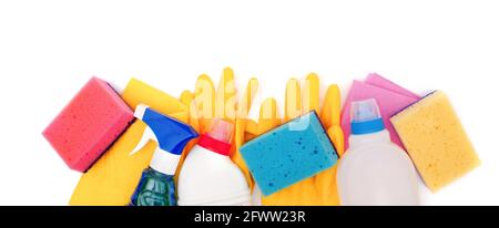 top view on kitchen sponges, yellow household gloves, bottles of cleaning spray and detergents and surface cleaning wipes isolated on white background Stock Photo