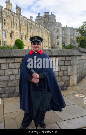 Windsor, Berkshire, UK. 24th May, 2021. Windsor Castle Warden Art Ramirez is happy to be back on duty as Windsor Castle has reopened to visitors. Following the lifting of some of the Covid-19 Coronavirus lockdown restrictions, some locals and visitors and returning to Windsor although the town still remains quieter than usual. Credit: Maureen McLean/Alamy Stock Photo