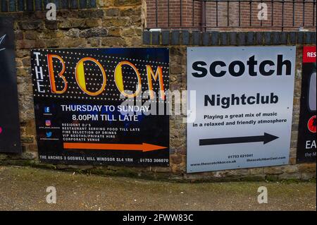 Windsor, Berkshire, UK. 24th May, 2021. Signs for nightclubs in Windsor. Following the lifting of some of the Covid-19 Coronavirus lockdown restrictions, some locals and visitors and returning to Windsor although the town still remains quieter than usual. Credit: Maureen McLean/Alamy Stock Photo
