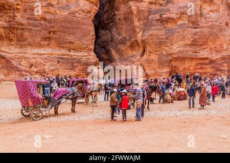 PETRA, JORDAN - MARCH 23, 2017: Tourists in the ancient city Petra, Jordan Stock Photo