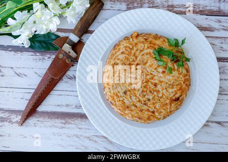 Omelette and whole noodle omelet on a plate. Stock Photo