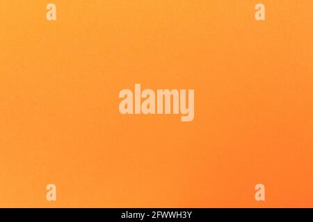 Coral orange high detailed felt texture abstract art background, solid color carton surface with empty space Stock Photo