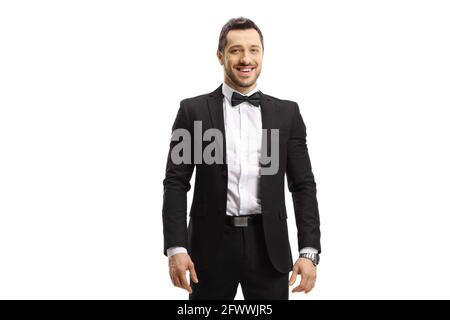 Man in a suit and bow tie smiling at the camera isolated on white background Stock Photo