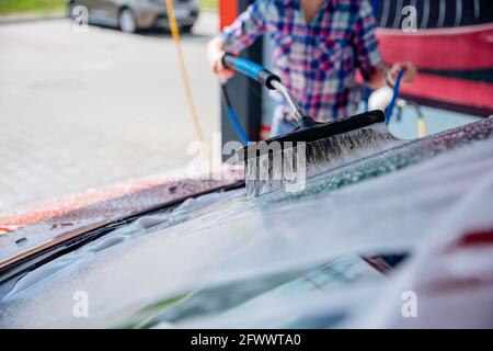 Car washing self service concept using active foam. Stock Photo
