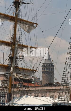 tall ships Istanbul port visit during Tall ship regatta, Historical Genoese Galata Tower at background Stock Photo