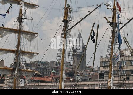 tall ships Istanbul port visit during Tall ship regatta, Historical Genoese Galata Tower at background Stock Photo