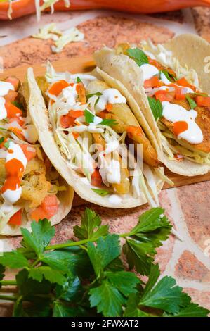 Baja California Style Fish Tacos With Toppings Stock Photo