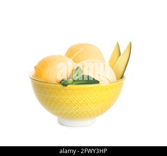 Bowl with tasty mango ice cream on white background Stock Photo