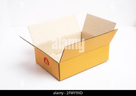 Empty open and closed brown cardboard box isolated on white background. Stock Photo