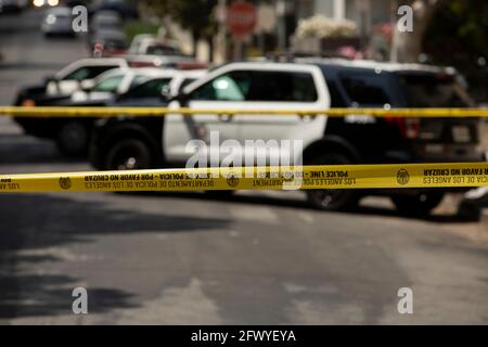 Los Angeles, California, USA - May 15, 2021: Cordon tape secures the scene of an LAPD incident. Stock Photo