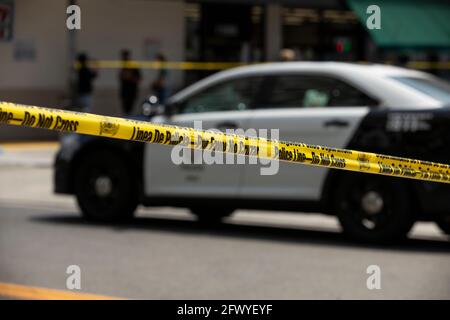Los Angeles, California, USA - May 15, 2021: Cordon tape secures the scene of an LAPD incident. Stock Photo