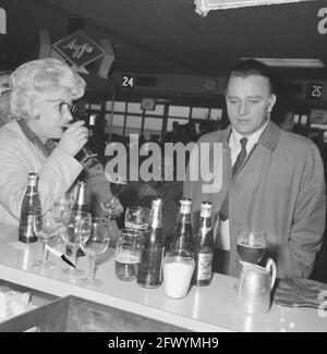 Richard Burton filming at Schiphol today, just before the shot Richard Burton was drinking refreshments in arrival waiting room [filming movie The Spy Who Came in from the Cold], April 26, 1965, actors, movies, movie stars, airports, The Netherlands, 20th century press agency photo, news to remember, documentary, historic photography 1945-1990, visual stories, human history of the Twentieth Century, capturing moments in time Stock Photo