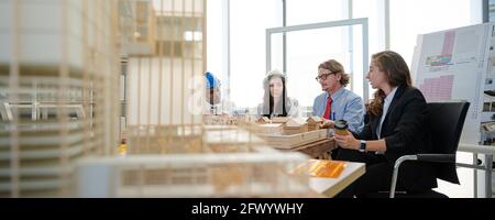 Group of diversity architect people meeting and working together at the office. Teamwork corporate concept. Stock Photo