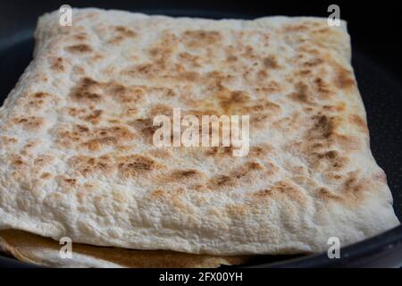 traditional turkish cuisine: flatbread. With Cheese or vegetables. Stock Photo