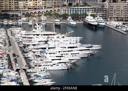 La Condamine, Monaco - February 20, 2021: Beautiful Luxury Yachts And Superyachts Are Lined Up In Port Hercule Monaco On The French Riviera, Europe, A Stock Photo