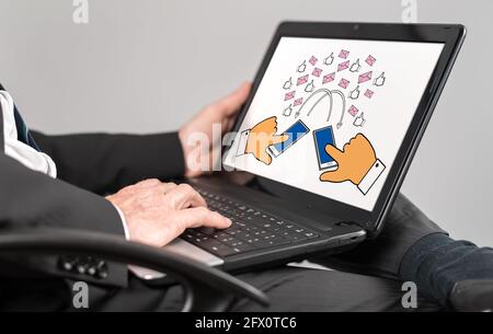 Businessman watching digital communication concept on a laptop Stock Photo