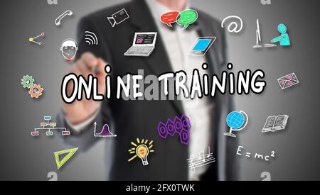 Online training concept drawn by a businessman in background Stock Photo
