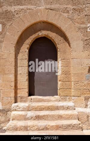 Closed entrance with iron gate, to the keep of medieval castle in the city of Lorca, Murcia, Spain Stock Photo