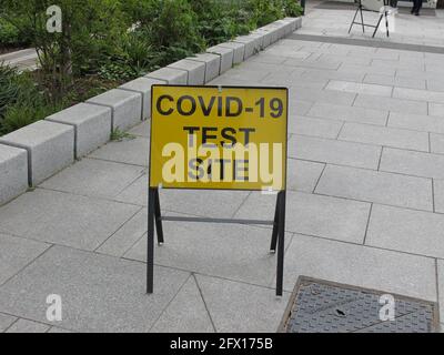 Covid 19 test site road sign Stock Photo