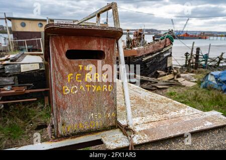 Old post box for the Ferry Boatyard Upnor Kent on the banks of the River Medway.