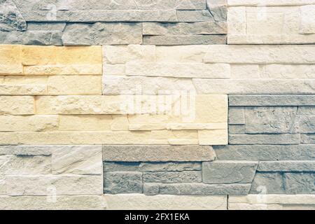 Stonewall background pattern for interior fashion design - Stone wall backdrop texture for modern buildings furniture - Construction material abstract Stock Photo