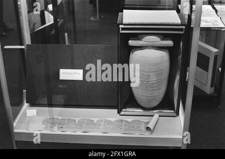 Copy of the Dead Sea Scrolls printed on sheepskin and packaged in a stone jar at a sales exhibition of fascimiles of rare books, drawings and manuscripts in Utrecht, February 3, 1981, leather, manuscripts, stone, exhibitions, The Netherlands, 20th century press agency photo, news to remember, documentary, historic photography 1945-1990, visual stories, human history of the Twentieth Century, capturing moments in time Stock Photo