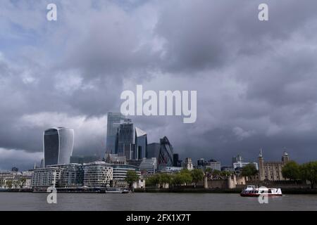 A cityscape that overlooks the river Thames showing the skyline of the City of London, the capital's financial district, on 24th May 2021, in London, England. Stock Photo