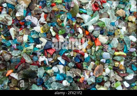Small pieces of multi colored slag glass makes a nice background or texture with slight bokeh effect. Stock Photo