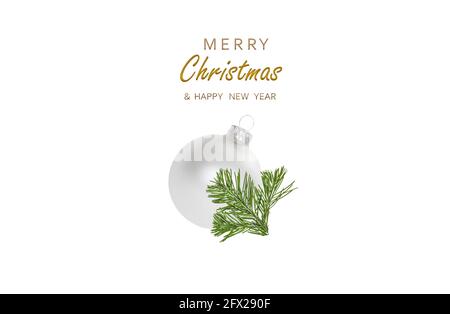 Merry Christmas and Happy New Year. Festive background with a round Christmas ball, a branch of a Christmas tree and decorative design elements. Set p Stock Photo