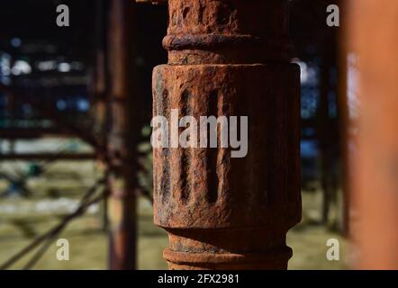 Rusty steel pillar on pier structure showing texture Stock Photo