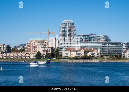 VICTORIA, VANCOUVER ISLAND, CANADA - 2016 SEPT 22: Harbour Air, a small passenger seaplane, at Victoria harbour is preparing to take off Stock Photo