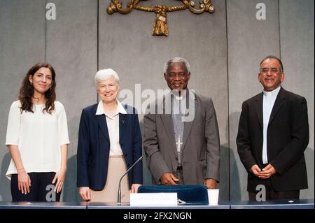 May 25,2021 :  From (L) Carolina Bianchi , Sr. Sheila Kinsey ,Card. Peter K. A. Turkson and P. Joshtrom Isaac Kureethadam poses during a   Press Conference on the Closing of the Special Year on the Fifth Anniversary of Laudato si' and the Presentation of the Laudato si' Platform for Action at the Vatican Press Room Stock Photo