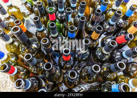 Empty wine bottles to be recycled Stock Photo