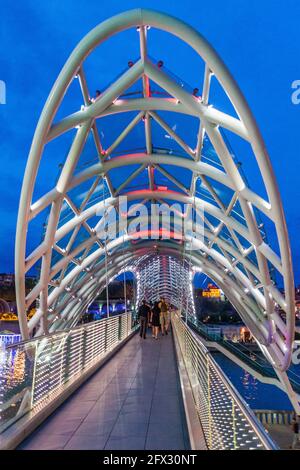 TBILISI, GEORGIA - JULY 15, 2017: Evening view of the Peace Bridge in Tbilisi, Georgia Stock Photo