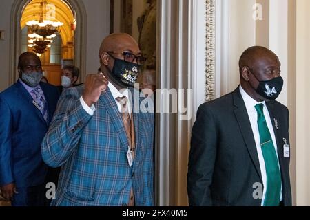 Philonise Floyd, the brother of George Floyd, left, and Attorney Benjamin Crump, right, are joined by members of George Floyd's family as they arrive for a press conference with Speaker of the United States House of Representatives Nancy Pelosi (Democrat of California) at the US Capitol in Washington, DC, Tuesday, May 25, 2021. Credit: Rod Lamkey/CNP /MediaPunch Stock Photo