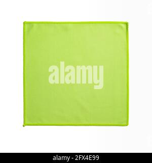 Square green microfiber cloth isolated on white background. Soft non-woven microfiber material for cleaning objects and surfaces. Housework, cleaning. Stock Photo