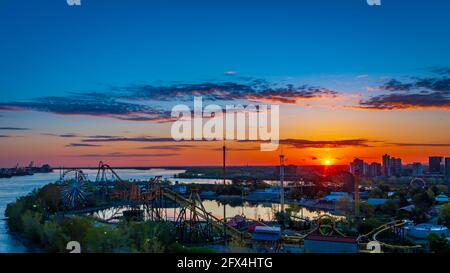 Beautiful sunrise view over La Ronde amusement park located on the northern tip of Saint Helen's island, in Montreal, Canada Stock Photo