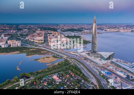 Russia, St.Petersburg, 16 May 2021: Drone point of view of highest skyscraper in Europe Lakhta Center at pink sunset, Headquarters of the oil company Stock Photo