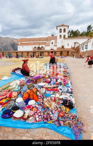 Outdoor textile and souvenir market in the town square of Chinchero, a rustic Andean village in the Sacred Valley, Urubamba, Cusco Region, Peru Stock Photo