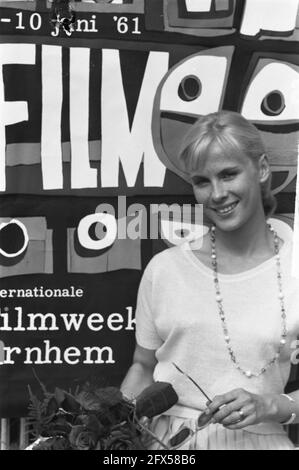Film Week Arnhem. Film actress Bibi Andersson in front of poster Filmweek, June 5, 1961, Actors, posters, film festivals, film stars, The Netherlands, 20th century press agency photo, news to remember, documentary, historic photography 1945-1990, visual stories, human history of the Twentieth Century, capturing moments in time Stock Photo