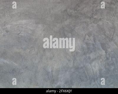 The beautiful texture on a rough cement surfaces wall or gray concrete wall. Blank space for copy and design. Stock Photo
