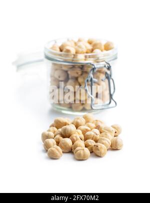 Peeled roasted hazelnut kernels isolated on white background. Stock Photo