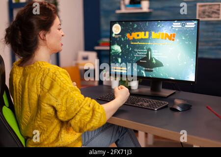 Professional pro gamer playing space shooter video game new graphics on  powerful computer from home. Virtual shooter game in cyberspace, esports  player performing on pc gaming tournament Stock Photo - Alamy