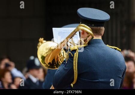 Central Band of the Royal Air Force trombone player at the Queens Diamond Jubilee celebration in London, UK. Glorious Victory sheet music, quick march Stock Photo